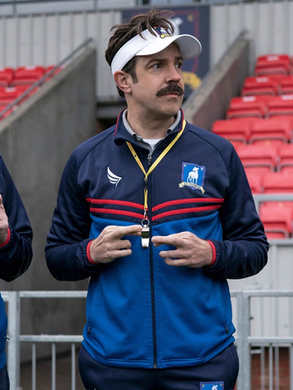 https://www.paragonjackets.com/wp-content/uploads/2022/12/Jason-Sudeikis-Ted-Lasso-Blue-Coach-Fleece-Tracksuit-1.jpg